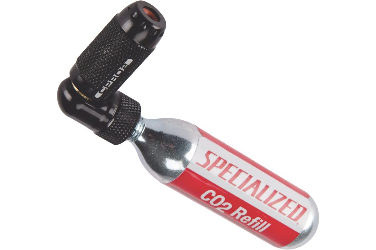 Inflador de CO₂ Specialized CPRO2 Trigger compacto y ligero, con válvula dosificadora y cartucho de 16g, ideal para emergencias en ciclismo de carretera y montaña.