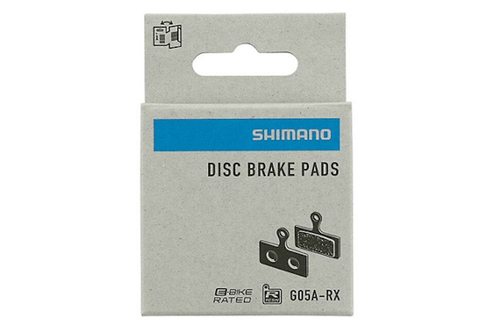 Pastillas de freno de resina Shimano G05A-RX y muelle con pasador de aletas