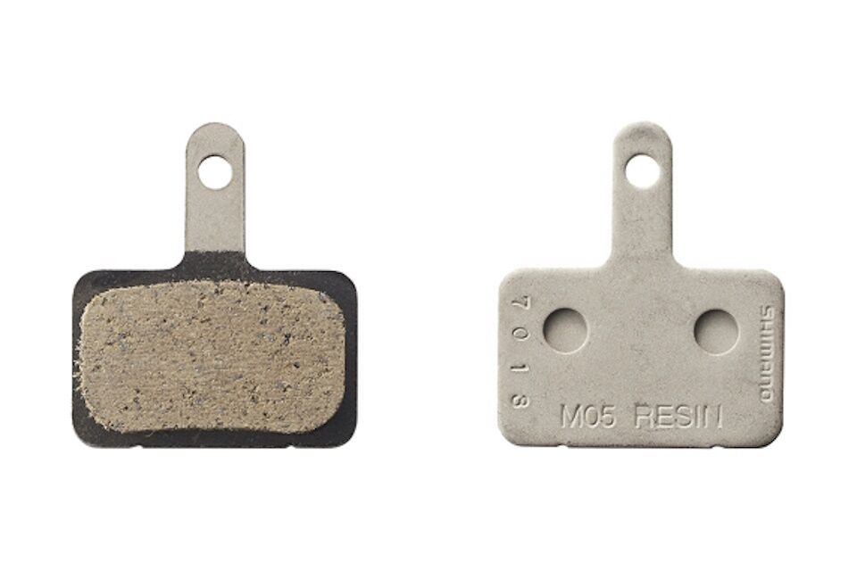 Pastillas de freno de resina Shimano M05-RX muelle con pasador de aletas - Imagen 2